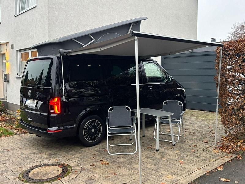 Schwarz Gebraucht 2023 VW T6.1 California Van | 64.490 € (Etwas zu teuer) - Bild 1/4