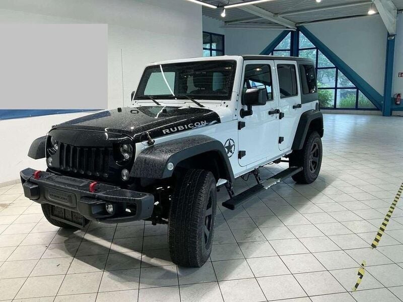Weiß Gebraucht 2016 Jeep Wrangler Unlimited Sahara SUV | 32.950 € (Fairer Preis) - Bild 1/4