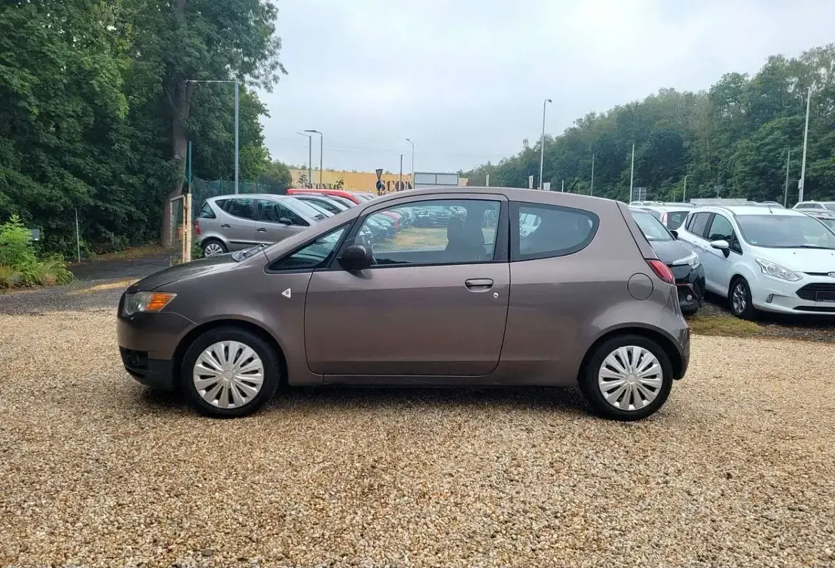 Gebraucht Mitsubishi Colt 95 PS (69 kW) 2011 Granitbraun (m) Kleinwagen