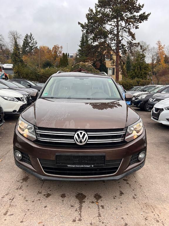 Toffee/graciosabraun Gebraucht 2013 VW Tiguan Sportline SUV | 10.999 € (Guter Preis) - Bild 1/4