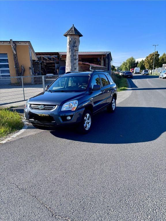 Grau Gebraucht 2010 Kia Sportage SUV | 6.700 € (Fairer Preis) - Bild 1/4