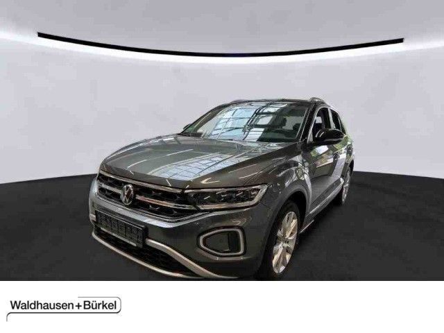 Indiumgrau Gebraucht 2023 VW T-Roc Style SUV | 28.450 € (Fairer Preis) - Bild 1/4