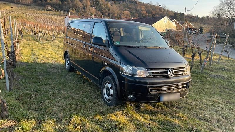 Second-hand VW Caravelle 180 CP (132 kW) 2011 Negru Van