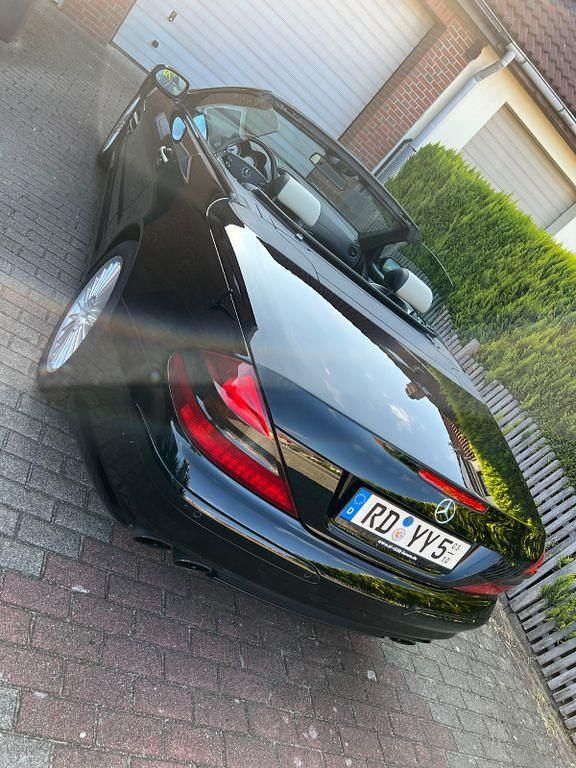 Schwarz Gebraucht 2003 Mercedes SL55 AMG AMG Cabrio | 37.055 € (Fairer Preis) - Bild 1/4