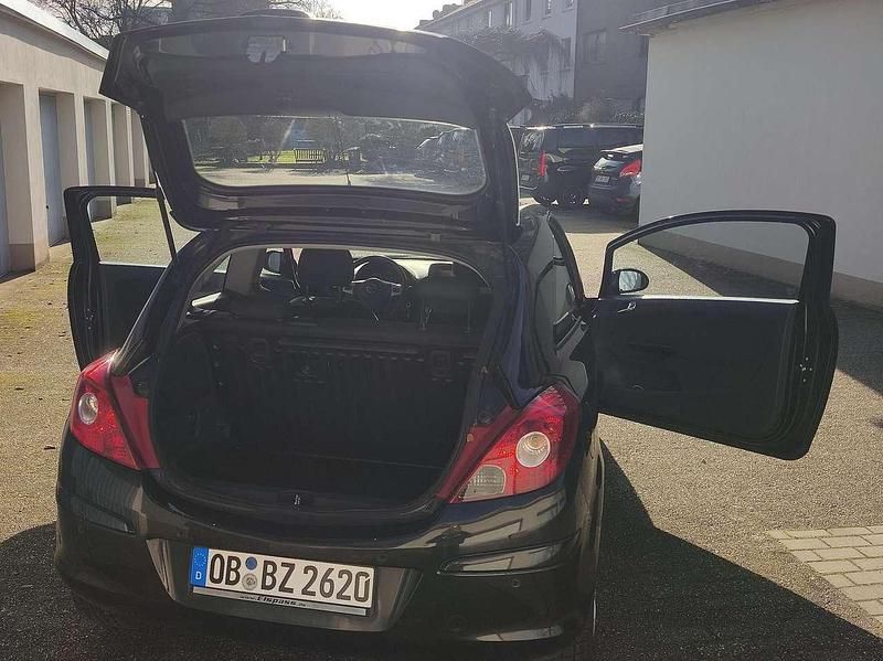 Gebraucht Opel Corsa Active 69 PS (50 kW) 2013 Schwarz Kleinwagen