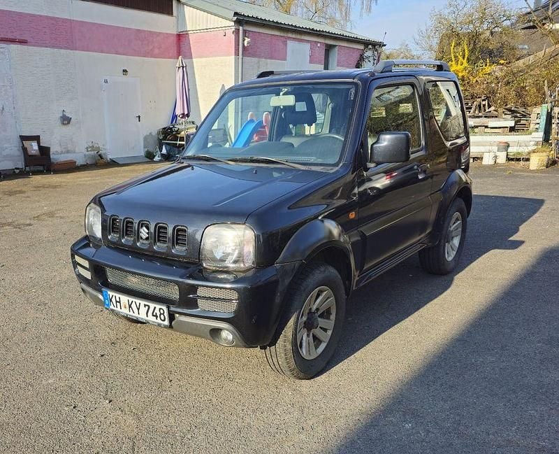 Usado Suzuki Jimny Style 86 HP (63 kW) 2012 Preto SUV