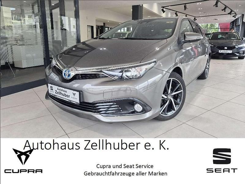 Platinumbronze metallic Gebraucht 2017 Toyota Auris Hybrid Limousine | 14.370 € (Fairer Preis) - Bild 1/4