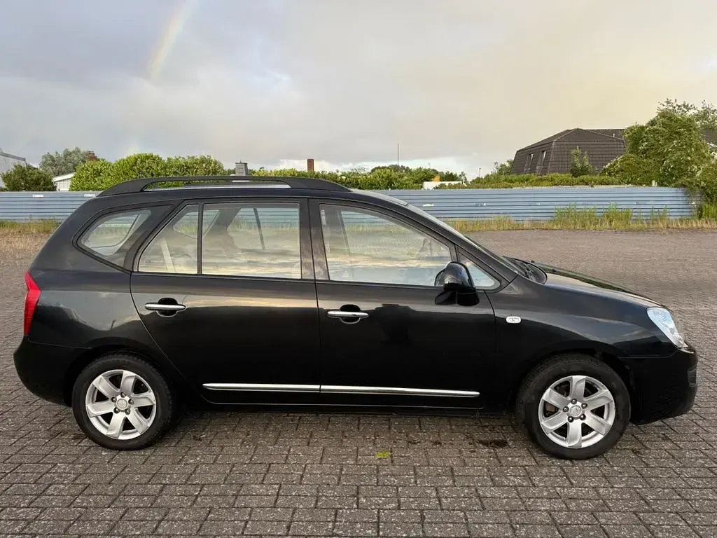 Gebraucht Kia Carens EX 144 PS (105 kW) 2010 Schwarz Van / Kleinbus