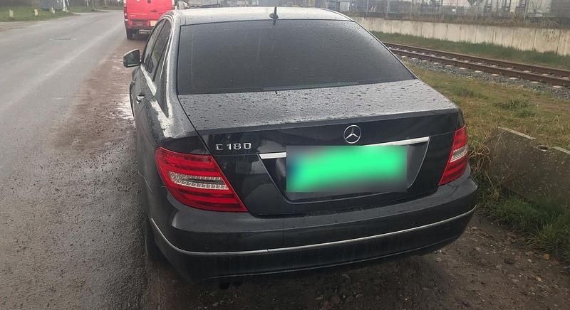 Second-hand Mercedes C180 156 CP (114 kW) 2012 Negru Berlinǎ