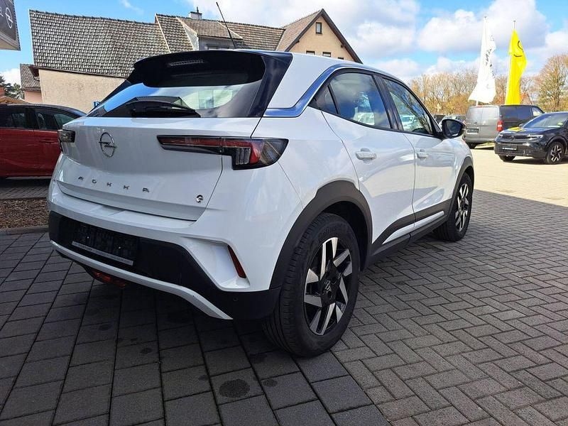 Gebraucht Opel Mokka-e Elegance 100 kW (136 PS) 2024 Lack weiss banquise/typ aussen SUV