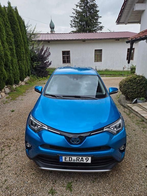 Blau Gebraucht 2016 Toyota RAV4 Hybrid Executive SUV | 18.400 € (Fairer Preis) - Bild 1/4