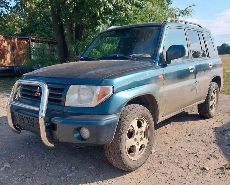 Grün Gebraucht 2002 Mitsubishi Pajero Comfort Edition SUV | 1.999 € (Fairer Preis) - Bild 1/4