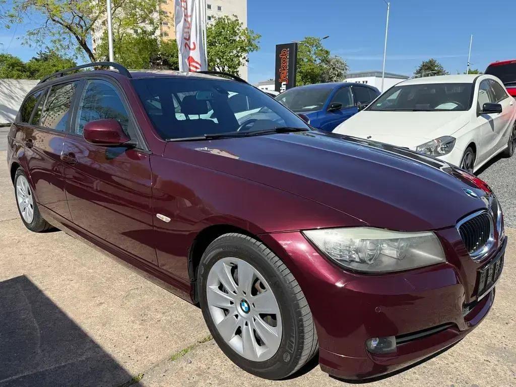 Second-hand BMW 318 143 CP (105 kW) 2009 Roșu Break