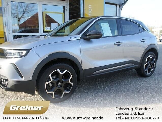 Kontrast grau (metallic) Gebraucht 2024 Opel Mokka Ultimate SUV | 22.890 € (Etwas zu teuer) - Bild 1/2