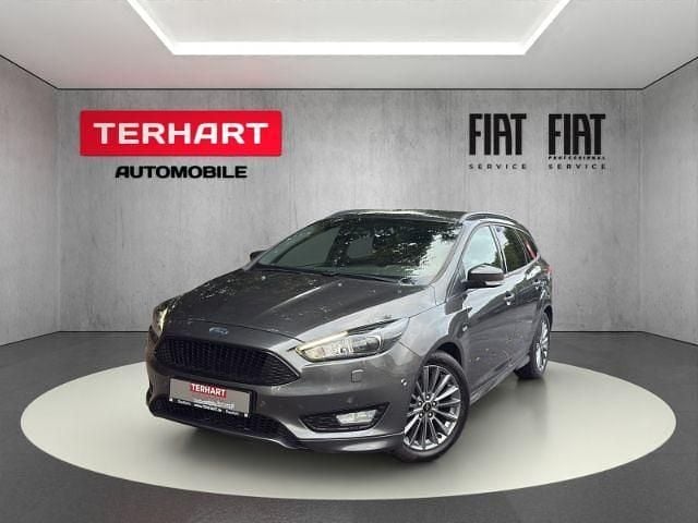 Magneticgrau (metallic) Gebraucht 2017 Ford Focus ST-Line Kombi | 11.987 € (Teuer) - Bild 1/4