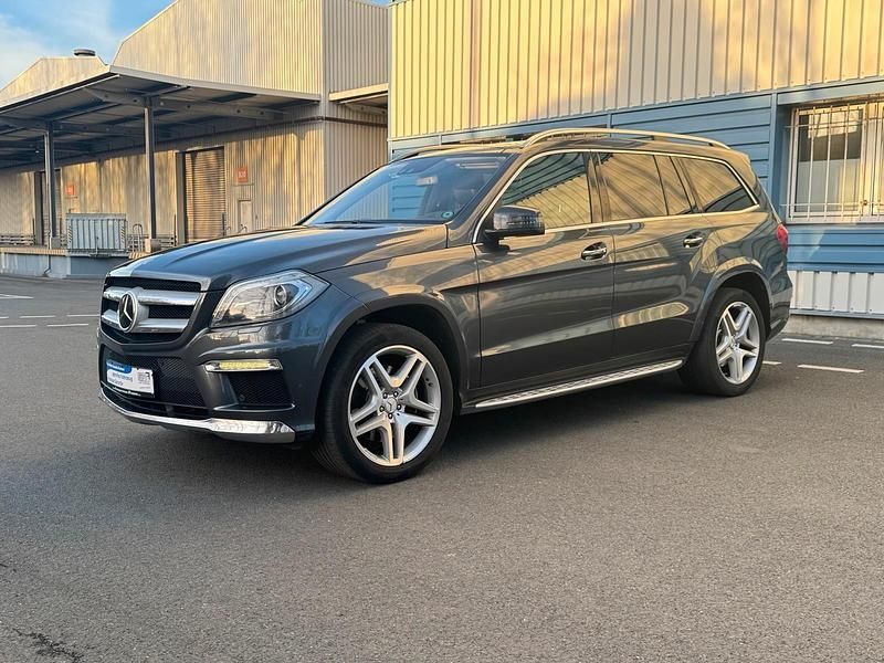 Tenoritgrau metalliclack Gebraucht 2013 Mercedes GL350 AMG SUV | 26.999 € (Guter Preis) - Bild 1/4