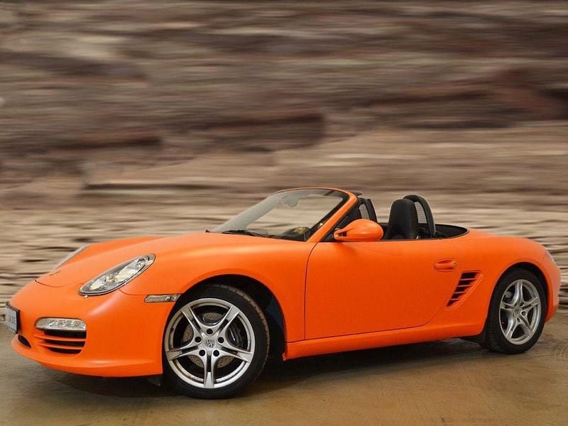 Gebraucht Porsche Boxster 256 PS (188 kW) 2009 Mattorange (foliert) / arktis Cabrio