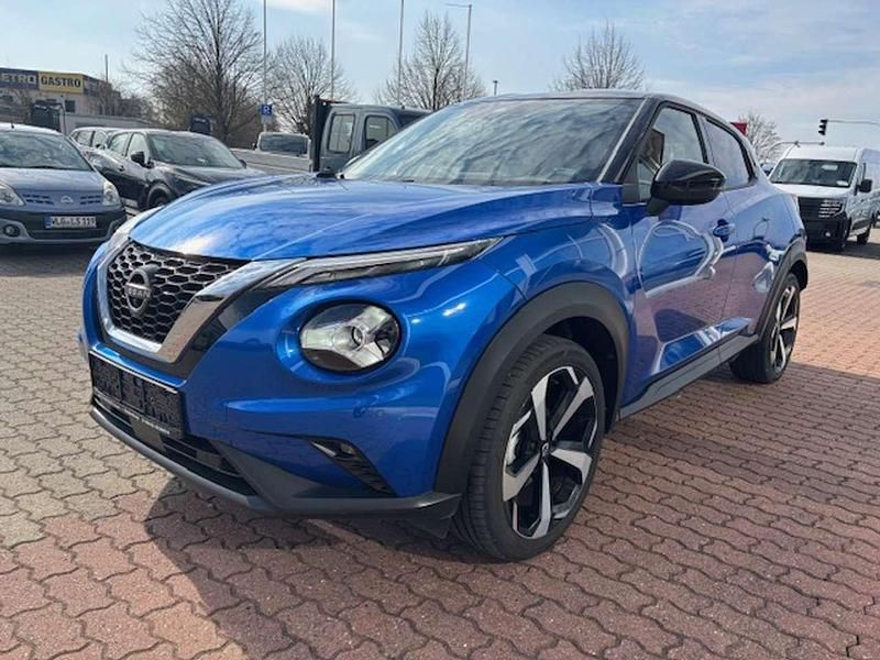Gebraucht Nissan Juke Tekna 114 PS (83 kW) 2023 Magnetic blue metallic/dach in SUV