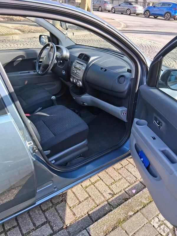 Gebraucht Daihatsu Sirion 91 PS (66 kW) 2011 Grau Kleinwagen