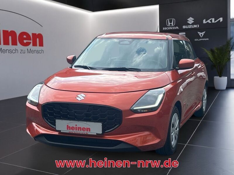 Orange Neu 2025 Suzuki Swift Club Limousine | 16.980 € - Bild 1/4