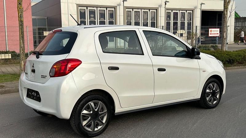 Gebraucht Mitsubishi Space Star Diamant Edition 71 PS (52 kW) 2015 Weiß Kleinwagen