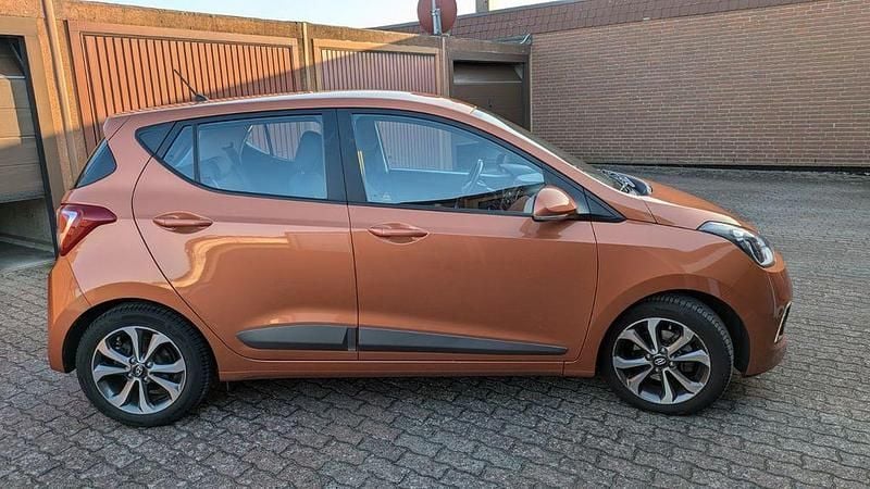 Orange Gebraucht 2014 Hyundai i10 Trend Kleinwagen | 6.800 € (Fairer Preis) - Bild 1/4