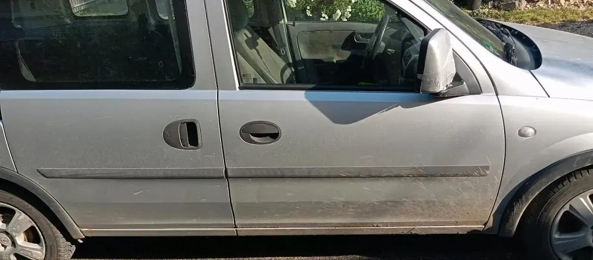 Gebraucht Opel Combo 75 PS (55 kW) 2004 Silber Van / Kleinbus