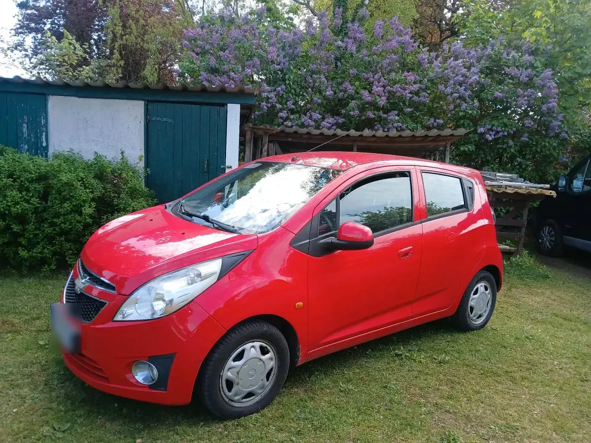 Second-hand Chevrolet Spark 68 CP (50 kW) 2011 Roșu Hatchback