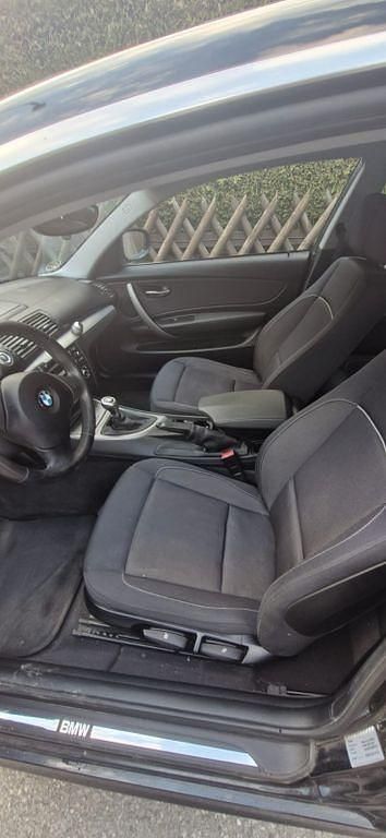 Używany BMW 118 Performance 143 KM (105 kW) 2010 Czarny Hatchback
