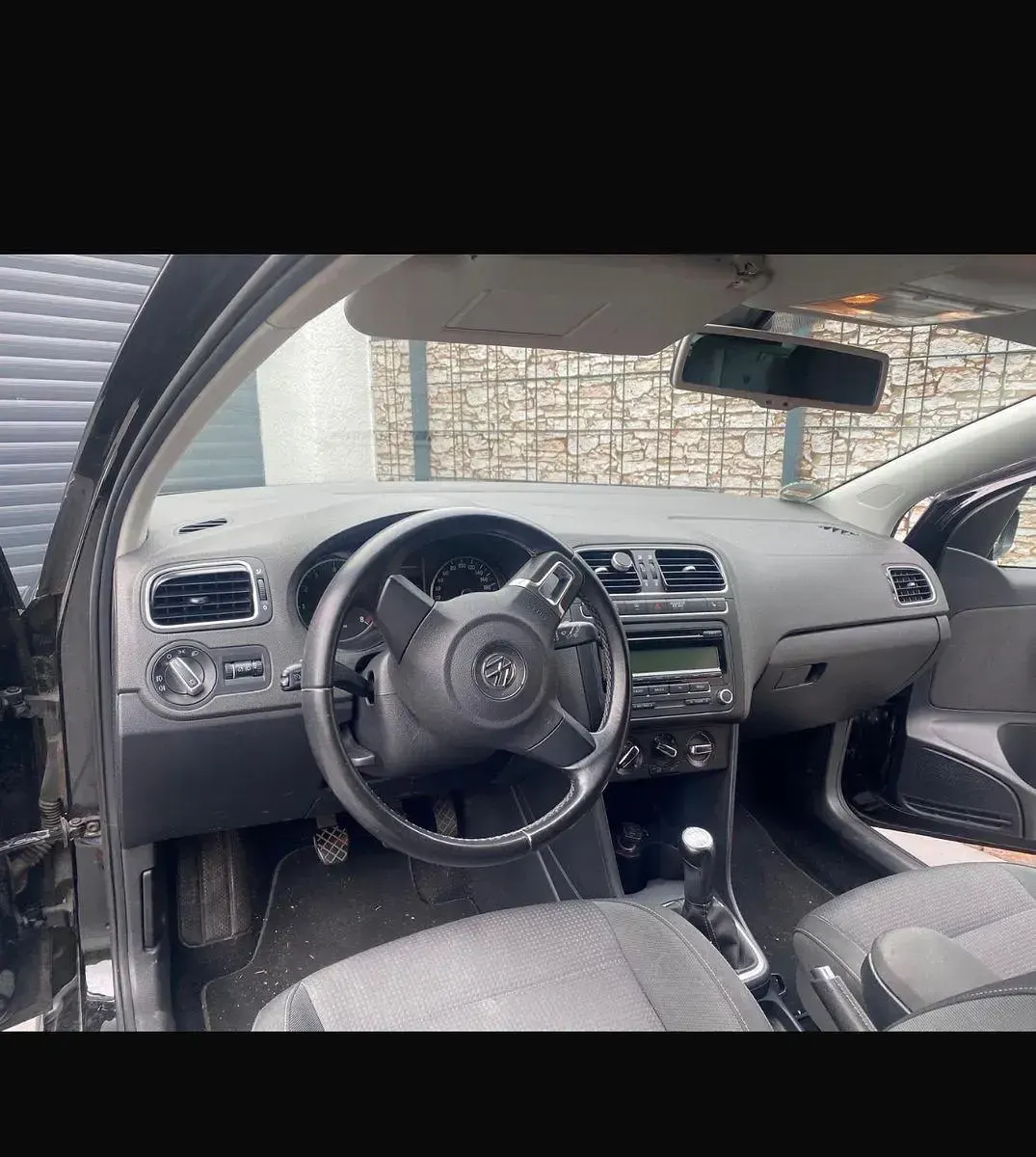 Gebraucht VW Polo Team 60 PS (44 kW) 2011 Schwarz Kleinwagen