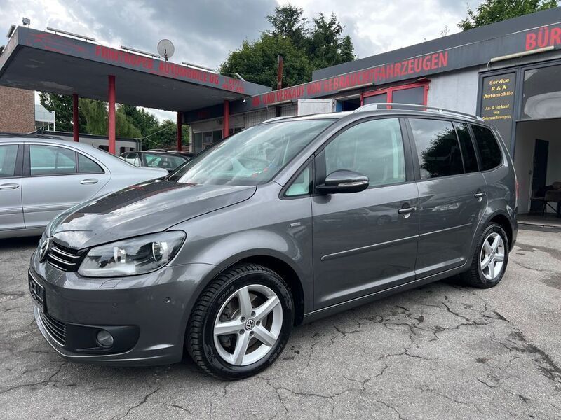 Grau Gebraucht 2013 VW Touran Life Van / Kleinbus | 10.900 € (Fairer Preis) - Bild 1/4