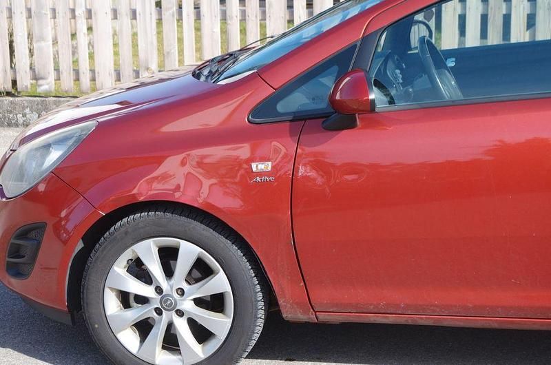 Gebraucht Opel Corsa Active 101 PS (74 kW) 2013 Orange Kleinwagen