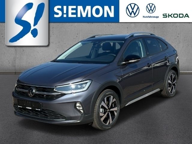 Grau Gebraucht 2024 VW Taigo Style SUV | 29.350 € (Teuer) - Bild 1/4