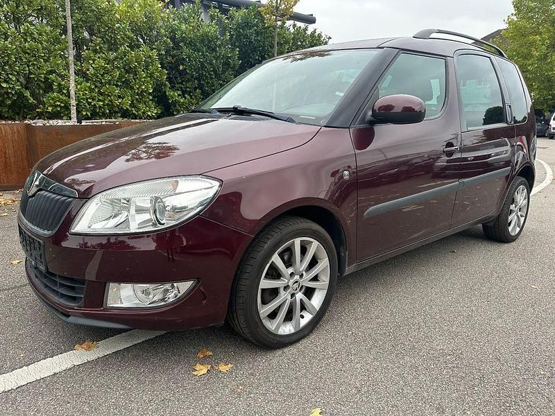 Cervena rosso brunello/rosso b Gebraucht 2011 Skoda Roomster Plus Edition Van / Kleinbus | 7.890 € (Fairer Preis) - Bild 1/4