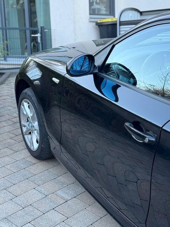 Gebraucht BMW 116 122 PS (89 kW) 2008 Schwarz Kleinwagen