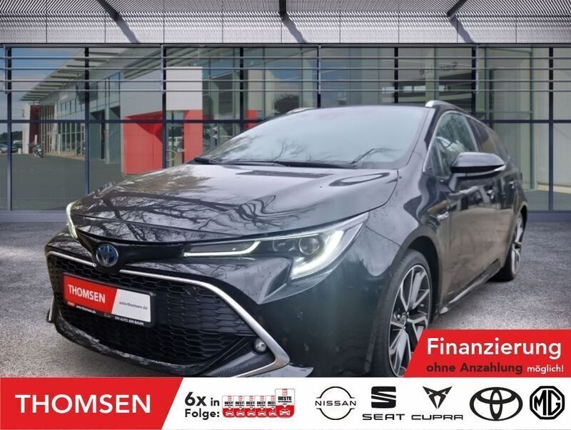 Black mica / ink Gebraucht 2021 Toyota Corolla Lounge Kombi | 24.985 € (Fairer Preis) - Bild 1/4