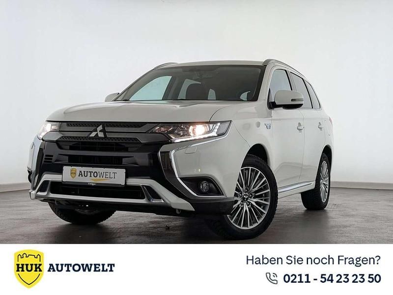 Weiß Gebraucht 2021 Mitsubishi Outlander P-HEV Basis SUV | 21.960 € (Fairer Preis) - Bild 1/3