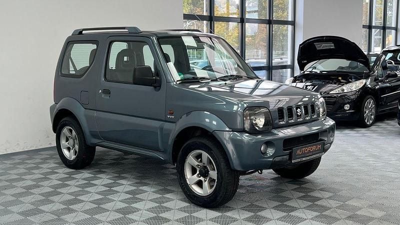 Grün Gebraucht 2005 Suzuki Jimny SUV | 7.444 € (Fairer Preis) - Bild 1/4