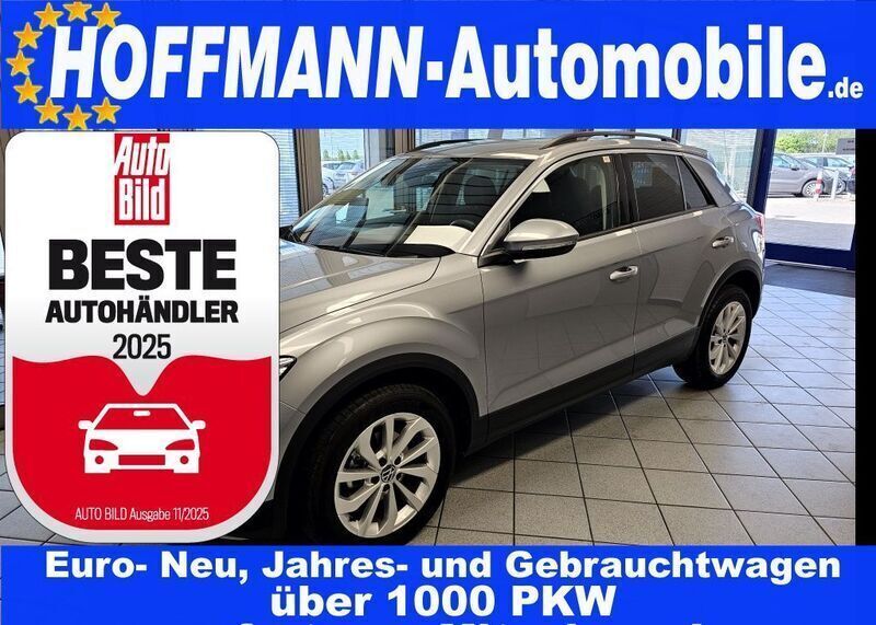 Pyritsilbermet. (metallic) Gebraucht 2024 VW T-Roc Life SUV | 24.150 € (Fairer Preis) - Bild 1/4