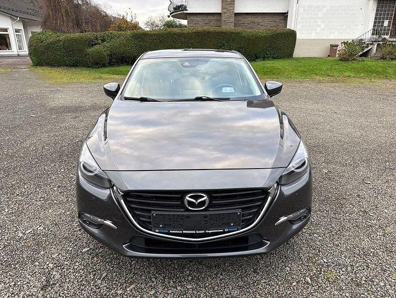 Grau Gebraucht 2018 Mazda 3 Exclusive-Line Limousine | 13.980 € (Fairer Preis) - Bild 1/4