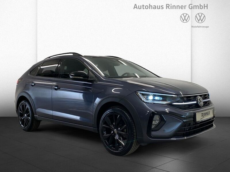 Rauchgrau metallic / schwarz Gebraucht 2024 VW Taigo R-line SUV | 28.590 € (Teuer) - Bild 1/4