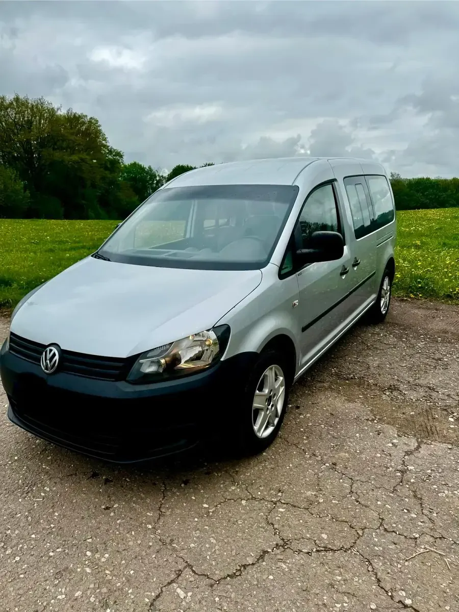 Second-hand VW Caddy Maxi 102 CP (75 kW) 2012 Argintiu Monovolum