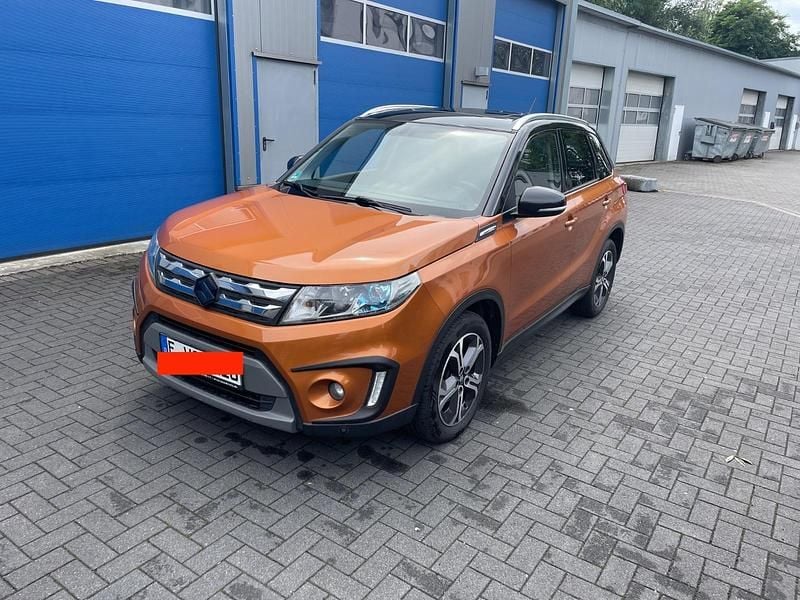 Orange Gebraucht 2015 Suzuki Vitara SUV | 7.600 € - Bild 1/4