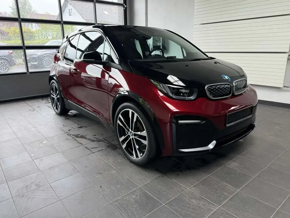 Gebraucht BMW i3 Performance 183 kW (250 PS) 2022 Aventurinrot m.akz. frozen gre Kleinwagen