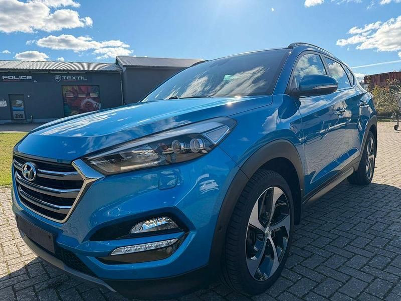 Blau Gebraucht 2015 Hyundai Tucson Premium SUV | 15.450 € (Fairer Preis) - Bild 1/4