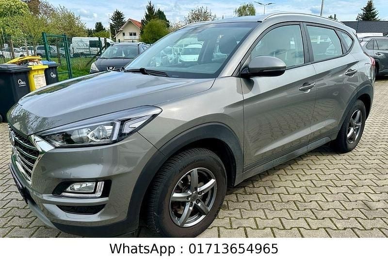 Grau Gebraucht 2018 Hyundai Tucson Premium SUV | 15.900 € (Superpreis) - Bild 1/4