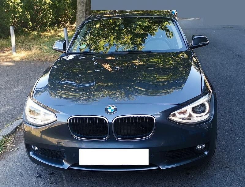 Grau Gebraucht 2013 BMW 116 Sport Line Kleinwagen | 5.799 € (Superpreis) - Bild 1/4