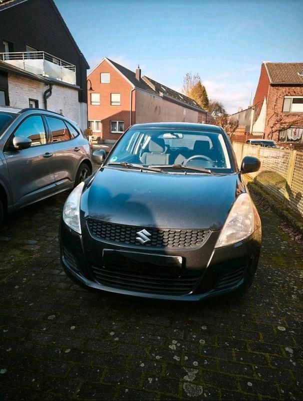 Second-hand Suzuki Swift 96 CP (70 kW) 2012 Negru Hatchback