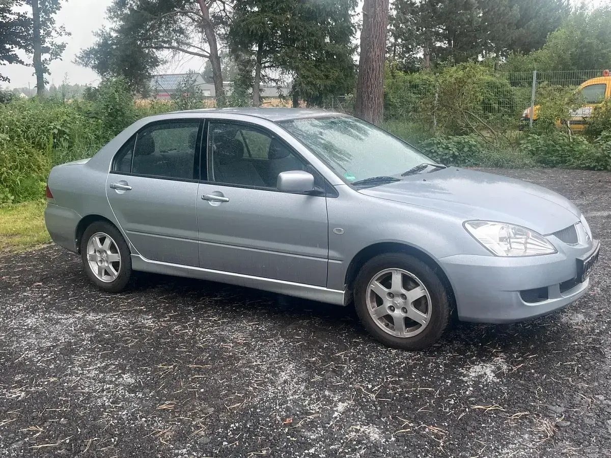Gebraucht Mitsubishi Lancer 98 PS (72 kW) 2003 Silber Limousine