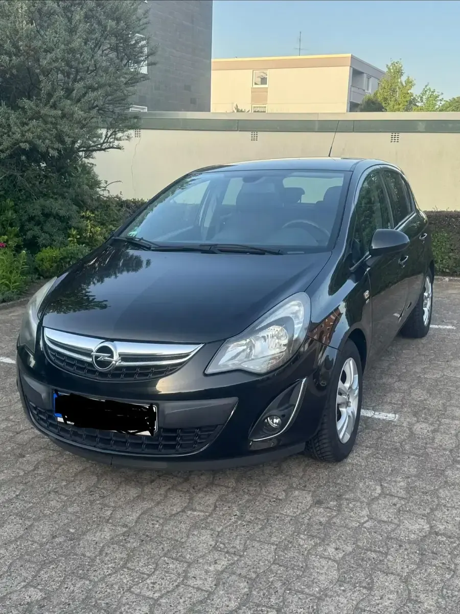 Gebraucht Opel Corsa 86 PS (63 kW) 2014 Schwarz Kleinwagen